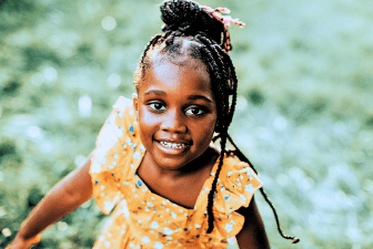 Young girl thriving thanks to healthy habits